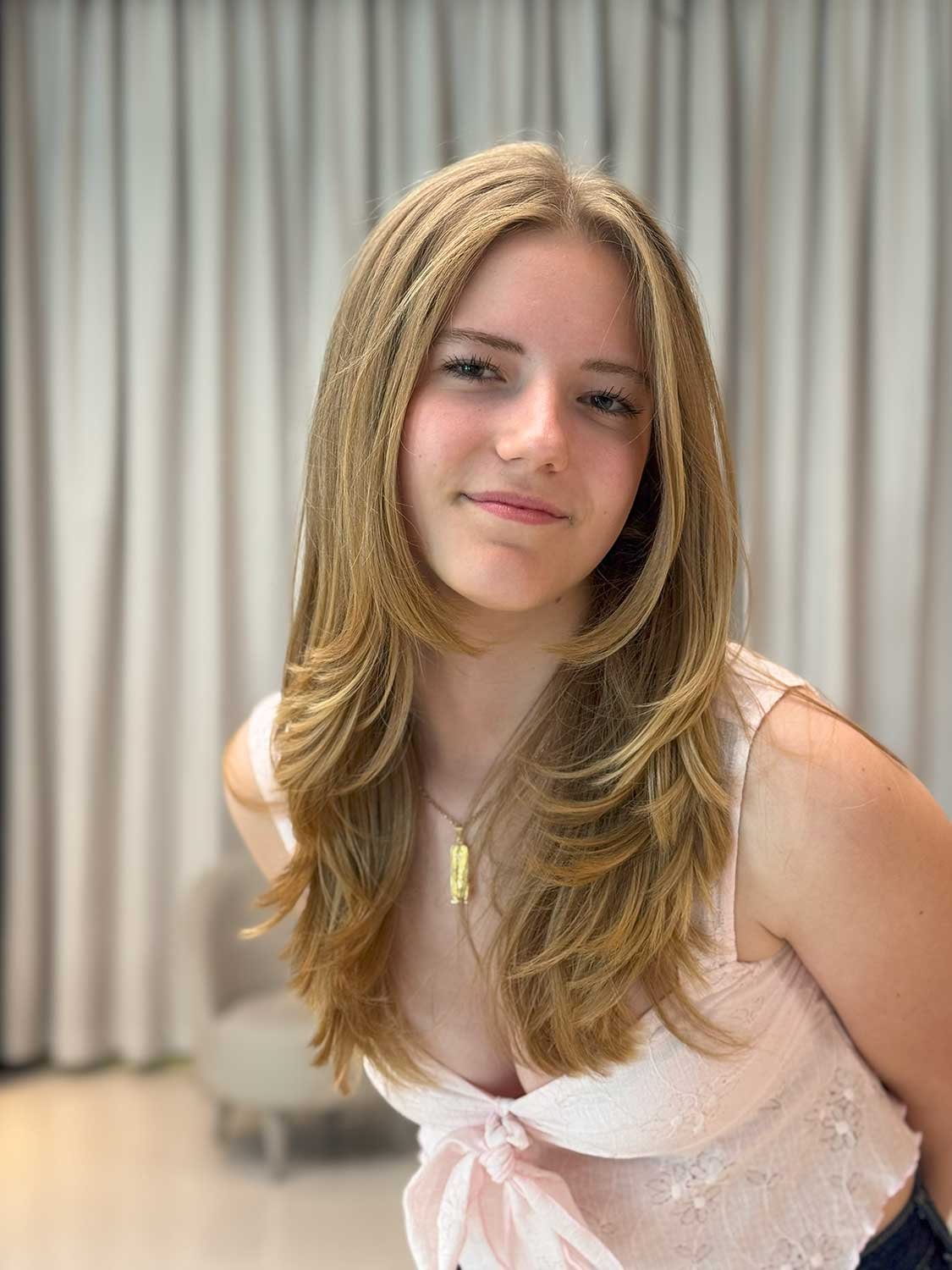 Fresh even colour after root touch-up and toning at Ivy Abu Dhabi