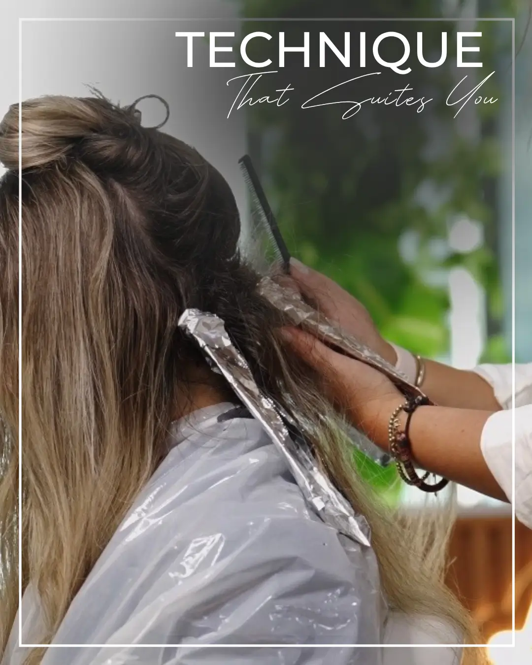 IVY Abu Dhabi stylist applying hair color with foils to a salon client.